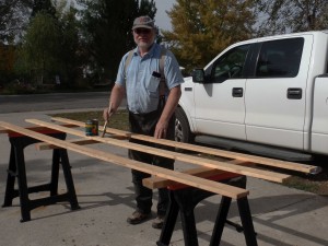 Varnishing the stake bed trailer sides