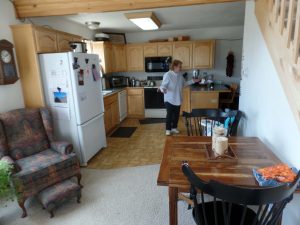 Entry and kitchen of orchard house