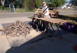 Jerry cutting load of firewood